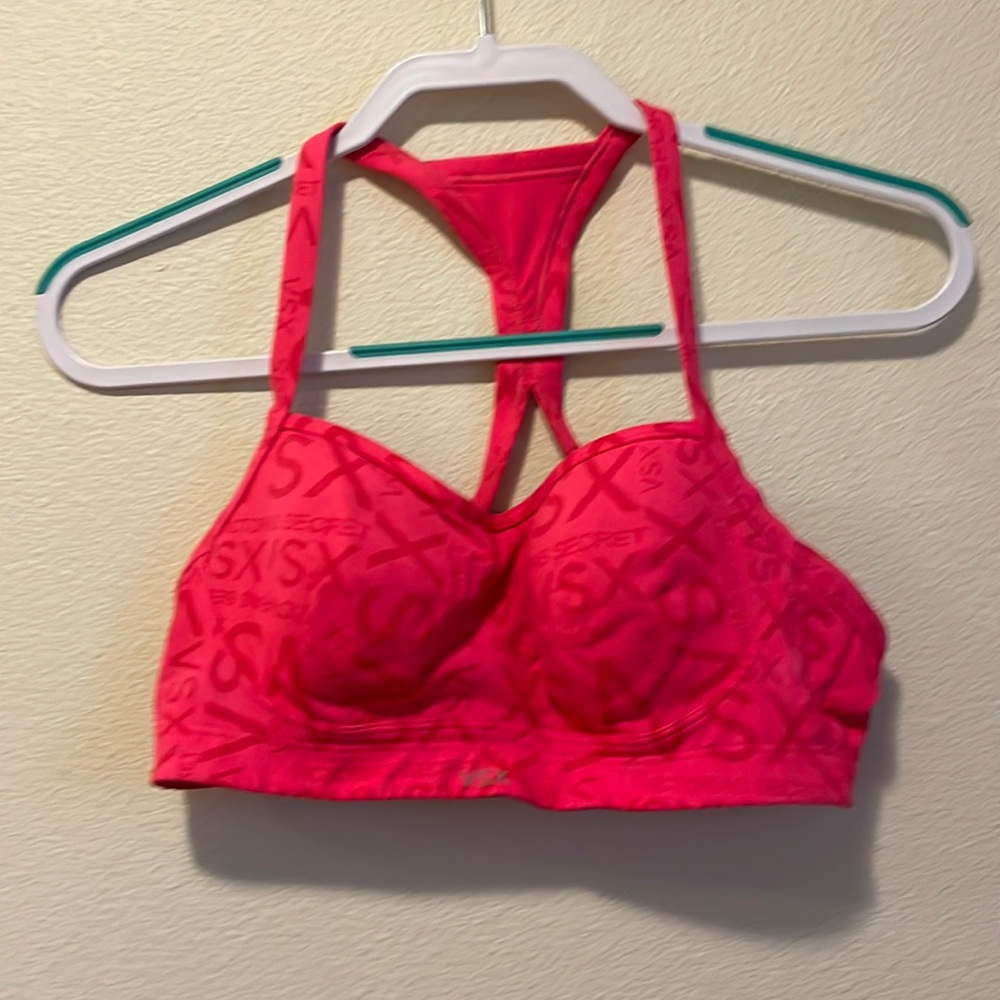 Victoria, sports bra, pink in color size 36B.